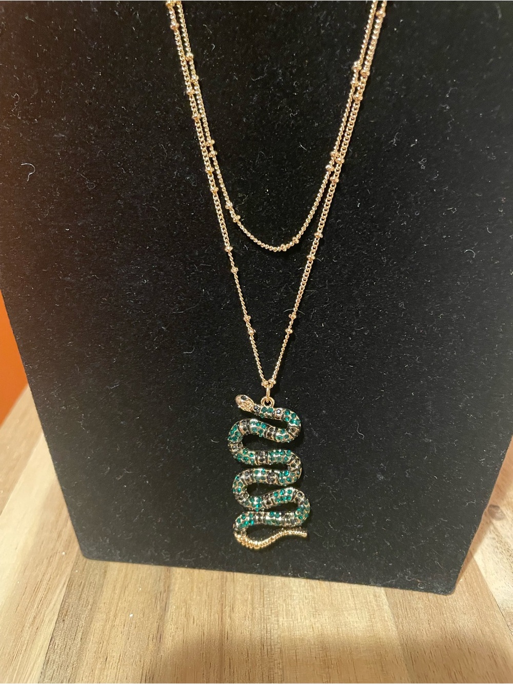 Gold Layered Necklace with Green Crystal Snake Pendant